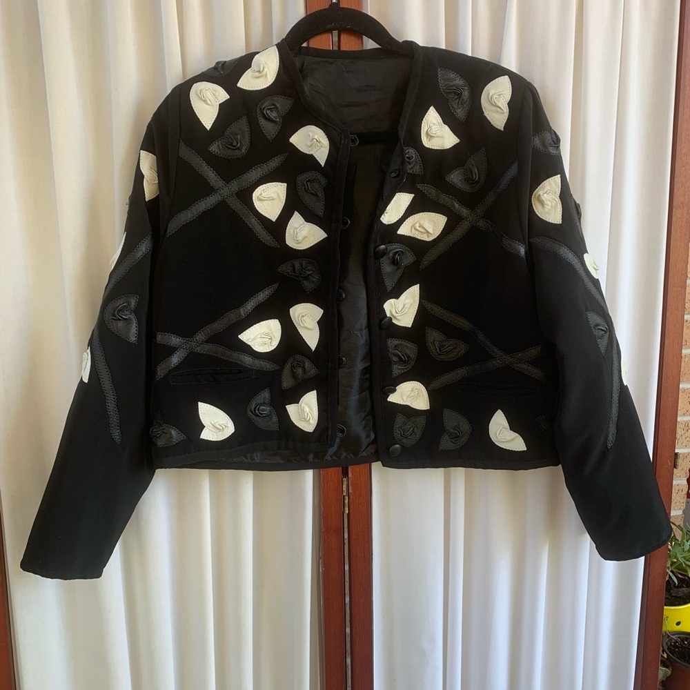 Vintage black jacket with leather accents!